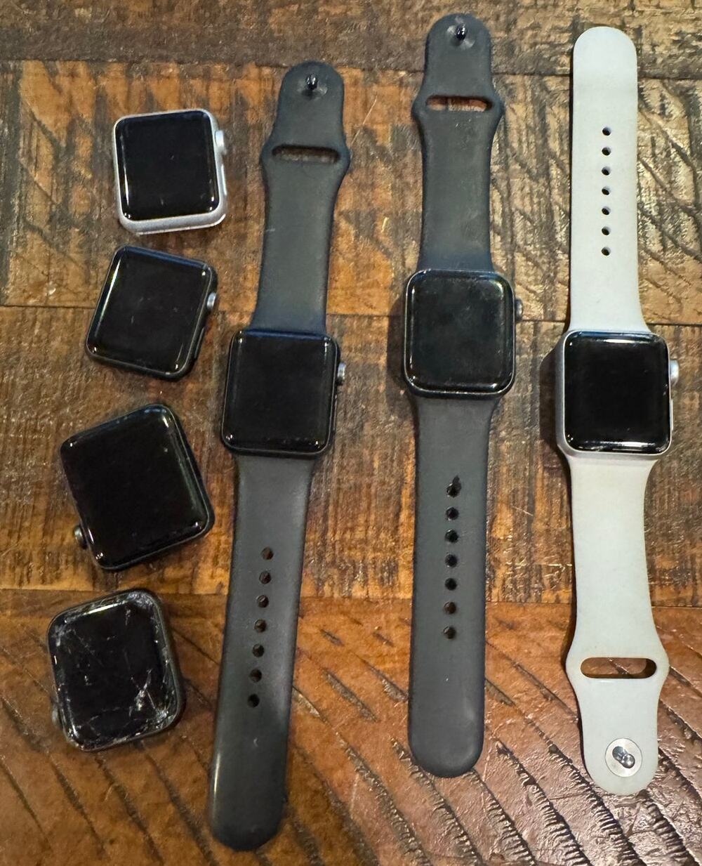 Lot of 7 Apple Watches FOR PARTS ONLY Series 1/3/4/7000 Series AS IS